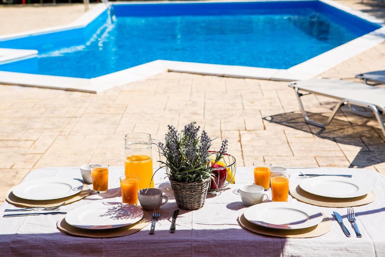Olive Grove Poolside Apartments Бенитсес Экстерьер фото