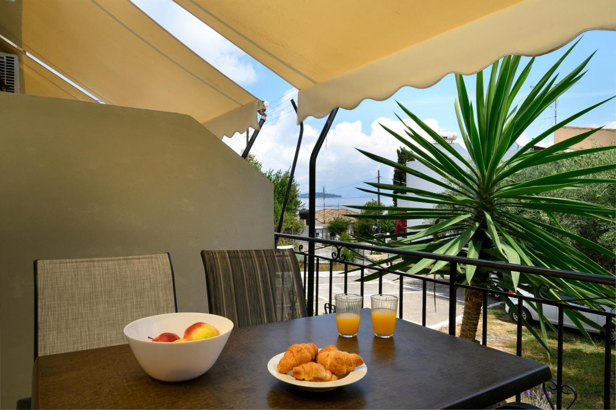 Olive Grove Poolside Apartments Бенитсес Экстерьер фото