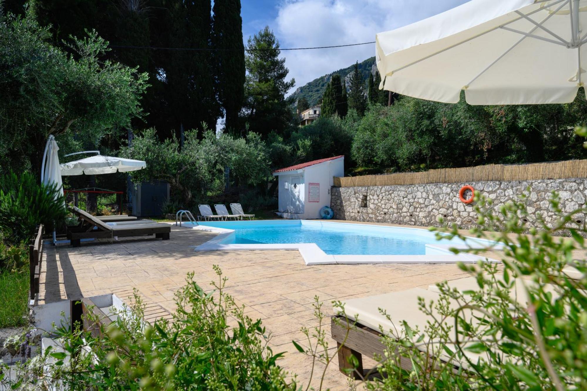 Olive Grove Poolside Apartments Бенитсес Экстерьер фото