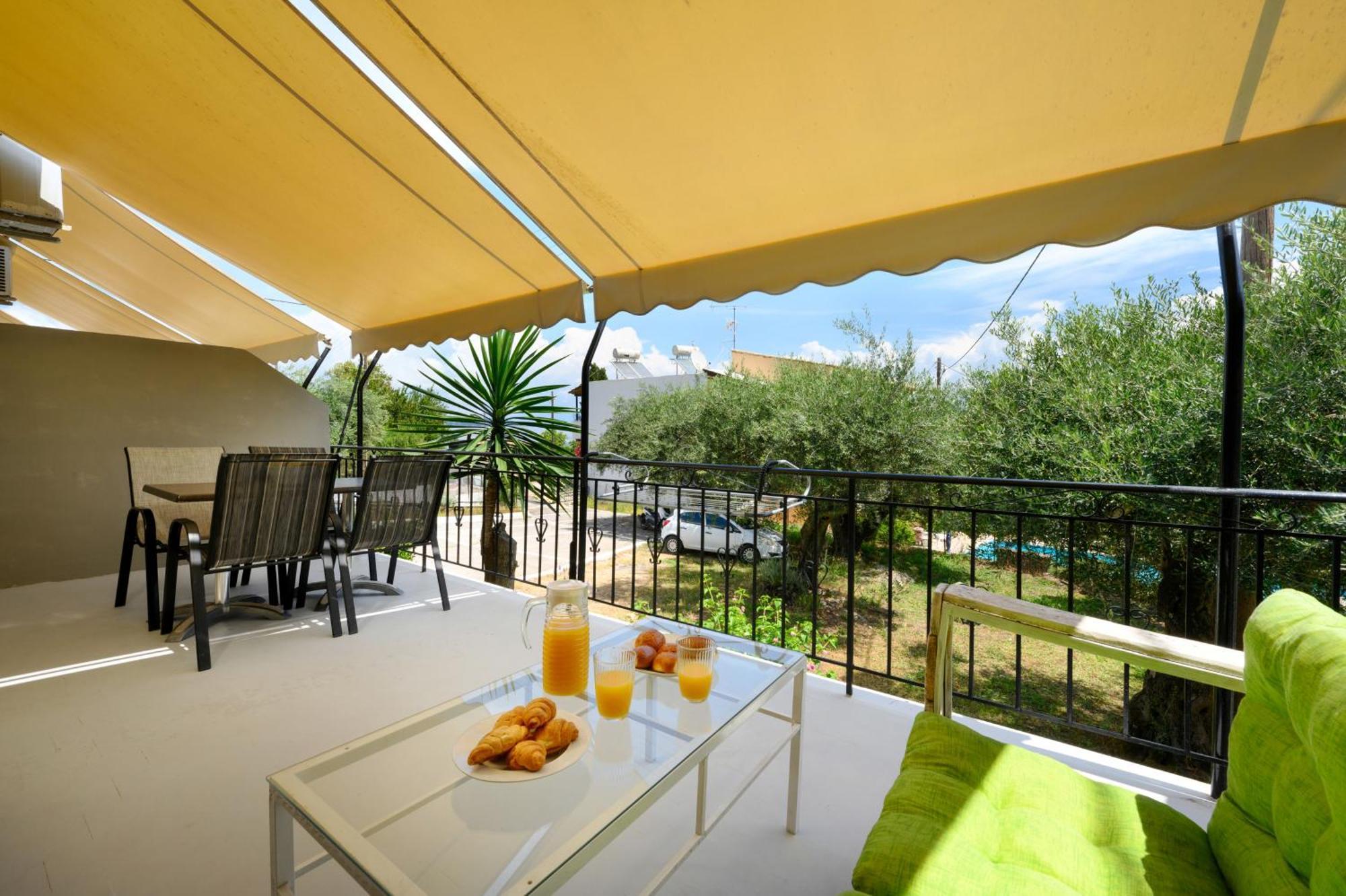 Olive Grove Poolside Apartments Бенитсес Экстерьер фото