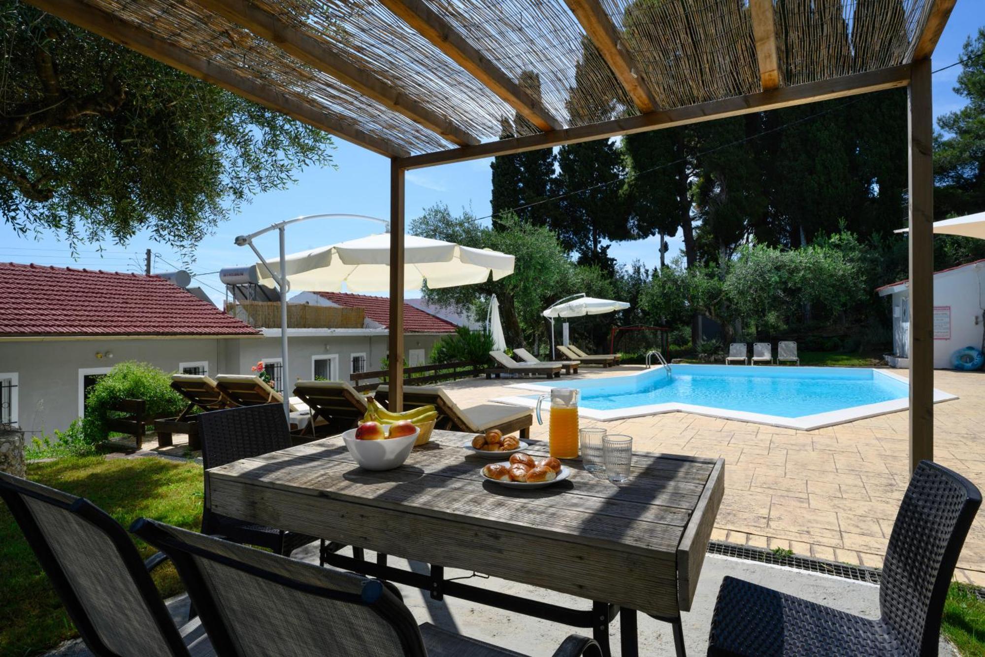 Olive Grove Poolside Apartments Бенитсес Экстерьер фото